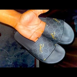 Gucci supreme tiger sandals